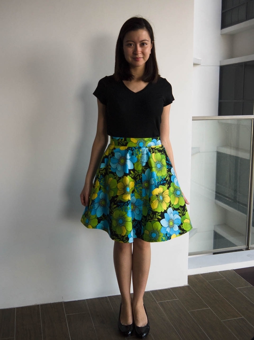 Me wearing a flared floral skirt